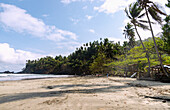 Sandy beach Praia das Sete Ondas on the east coast of the island of São Tomé in West Africa