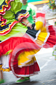 USA, California, San Francisco. Dancers in traditional dress at Cinco de Mayo parade.