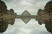 Double exposure of the glass pyramid entrance of the famed Louvre museum in Paris, France