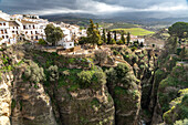 Tajo de Ronda gorge and the white houses of La Ciudad old town, Ronda, Andalusia, Spain