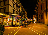 Restaurant near Piazza del Popolo on Viale G. Verdi in the evening, Montecatini Terme, Tuscany, Italy
