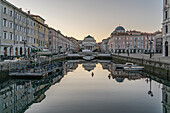 Morning on the Grand Canal with a view of St. Anthony&39;s Church in Trieste, Friuli Venezia Giulia, Italy.