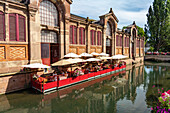 Canalside restaurant at the covered market in Colmar, Alsace, France