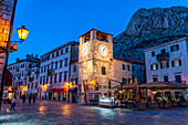 Clock tower on the main square of the old town in Kotor at dusk, Montenegro, Europe