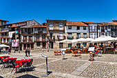 Restaurants on Praça de São Tiago square in the old town of Guimaraes, Portugal, Europe