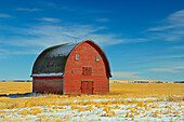Canada, Alberta, Vulcan. Red barn in winter