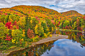 Canada, Nova Scotia. Indian Brook and forest in autumn
