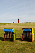 Beach chairs, lighthouse on the island of Pellworm, Pension beacon, North Friesland, North Sea, Schleswig-Holstein, Germany