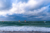Surfers in the Baltic Sea, Dazendorf, Ostholstein, Schleswig-Holstein, Germany