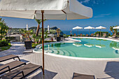 Pool with umbrellas in Forio, Ischia Island, Gulf of Naples, Campania, Italy