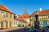 Gaasetorvet square with statue of physicist Hans Christian Örsted in downtown Rudkoebing, Langeland island, Denmark, Europe