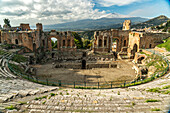 The ancient theater Teatro Greco and Mount Etna, Taormina, Sicily, Italy, Europe