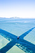 View from the iconic Golden Gate bridge down the water.