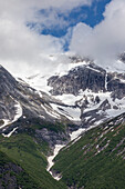 Snow covered mountains and classic U shaped valleys, Tracy Arm, Southeast Alaska, United States of America, North America