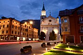 at Corso Italia with town church, Cortina d´Ampezzo, Dolomites Belluno, Veneto, Italy