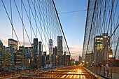 Brooklyn Bridge with the Financial District skyline of downtown Manhattan, New York, New York, USA