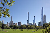 Sheep Meadow in Central Park with the &#39;Pencil&#39; skyscrapers of Billionaire Row (57 Street), Manhattan, New York, New York, USA