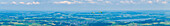 Panorama of the Flachgau with Obetrumer See on the left and Wallersee on the right and two paragliders from the Gaisberg, city mountain of Salzburg, Austria