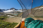 View from inside a tent of Russell Peak and Limestone Lakes Basin in Height-of-the-Rockies Provincial Park.