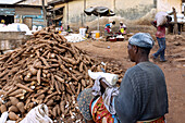 Women processing cassava at the market in Techiman in the Bono East region of northern Ghana in West Africa