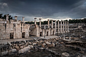 Palace buildings and magnificent columns during a thunderstorm, Ancient ruins city of Beit Shean on the Sea of Galilee, Israel, Middle East, Asia