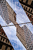 Double exposure of a highrise building on Montgomery street in the Financial District area of San Francisco, California.