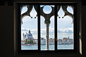Window view of Venice from the Casa dei Tre Oci in Giudecca, Venice, Veneto, Italy, Europe