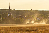 Grain harvest near Fröhstockheim, RÃ¶delsee, Kitzingen, Lower Franconia, Franconia, Bavaria, Germany, Europe