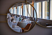 Reflection of the table decoration for the captain&#39;s dinner in the restaurant of river cruise ship Excellence Empress (travel agency Mittelthurgau) on the Danube, near Ybbs ad Donau, Wachau, Lower Austria, Austria, Europe