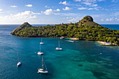 Aerial view of sailboats at anchor with Pigeon Island National Landmark in the distance, Gros Islet Quarter, St. Lucia, Caribbean