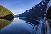 Side of expedition cruise ship World Voyager (nicko cruises) in Sunnylvsfjorden, near Stranda, Møre og Romsdal, Norway, Europe