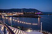Bow of World Voyager (Nicko Cruises) expedition cruise ship at pier looking out over town at dusk, Warrenpoint, County Down, Northern Ireland, United Kingdom, Europe