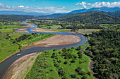 Aerial view of tour boat on crocodile watching tour on Rio Tarcoles River, near Tarcoles, Puntarenas, Costa Rica, Central America