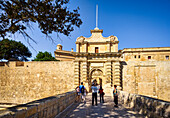 At the city gate of Victoria, Mdina, Malta, Europe