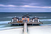 Ice cold winter evening at the Sellin pier on the island of Rügen, Mecklenburg-West Pomerania, Germany.
