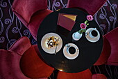 Still life with coffee and waffles in the lounge on board river cruise ship Excellence Rhône (travel agency Mittelthurgau), Trevoux, Ain, France, Europe