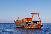 An abandoned old shipwreck in Walvis Bay near Walvis Bay on the coast of Namibia, Africa