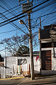Tangled wiring on the power pole, on which laundry is also dried, city of Oaxaca de Juárez, federal state of Oaxaca, Mexico, North America, Latin America