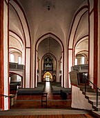 View from the chancel through the nave, in the background the Kemper organ and the original of the crown, Nikolaikirche, Siegen; North Rhine-Westphalia; Germany