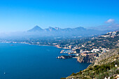 Costa Blanca, view from Morro de Toix on Altea-Mascarat, with Aitana massif in the background, Spain