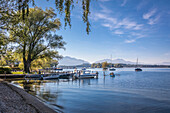 Boat dock on the western shore of the Fraueninsel in Lake Chiemsee, Upper Bavaria, Bavaria, Germany