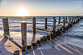 Weathered wooden pier on the beach in Zingst, Mecklenburg-West Pomerania, Northern Germany, Germany