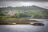 Dunvegan Castle on Loch Dunvegan, Isle of Skye, Highlands, Scotland, UK