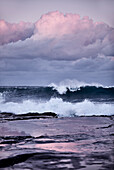 Waves crashing during a winter sunset at Dee Why Beach, Northern Beaches Sydney NSW Australia