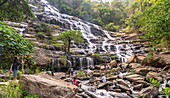 Visitors at Mae Ya Waterfall in Doi Inthanon National Park near Chom Thong, Chiang Mai, Thailand, Asia