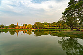 Lake at central Buddhist temple Wat Mahathat in UNESCO World Heritage Historical Park Sukhothai, Thailand, Asia