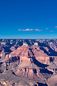 The Grand Canyon as seen from the South Rim in Arizona. The large gorge was eroded over millions of years by weather and the Colorado river that still runs through it. The reddish tint it has is due to the iron contained in the rock's minerals that oxide.