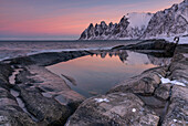 First morning light on Tungeneset beach on Senja island, Norway.