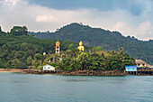 Ban Ao Salad fishing village and the Big Buddha of Wat Ao Salat on the island of Ko Kut or Koh Kood in the Gulf of Thailand, Asia