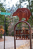 Corrugated metal entry sign for Bear Park near Cloudcroft, New Mexico.